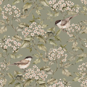 Dekornik Birds And Green Spring Behang — Een frisse behang met vogeltjes tussen lentebloesem in groene tinten, perfect voor een vrolijke, lichte kinderkamer. Detailopname van het patroon en de kleuren.