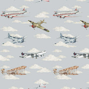 Dekornik Planes Color Behang — Een kleurrijk behang met vliegtuigjes die door de lucht zweven, perfect voor een speelse, avontuurlijke kinderkamer.