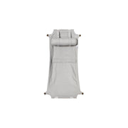 Oliver Furniture Extra Wood Toddler Rocker Seat Grey in een serene babykamer met natuurlijke materialen en zacht licht