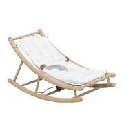 Oliver Furniture Wood Baby & Toddler Rocker Oak/white in een serene babykamer met natuurlijke materialen en zacht licht